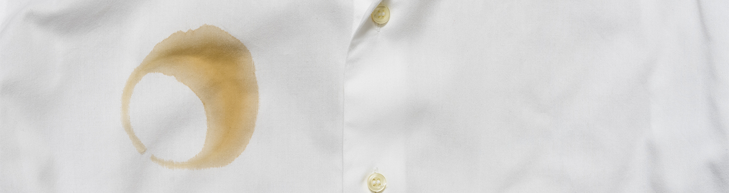 Coffee stain on a white dress shirt.