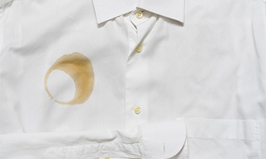 Coffee stain on a white dress shirt.