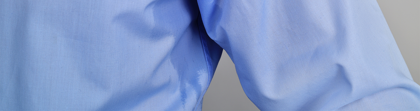 Sweat stain on a blue dress shirt.